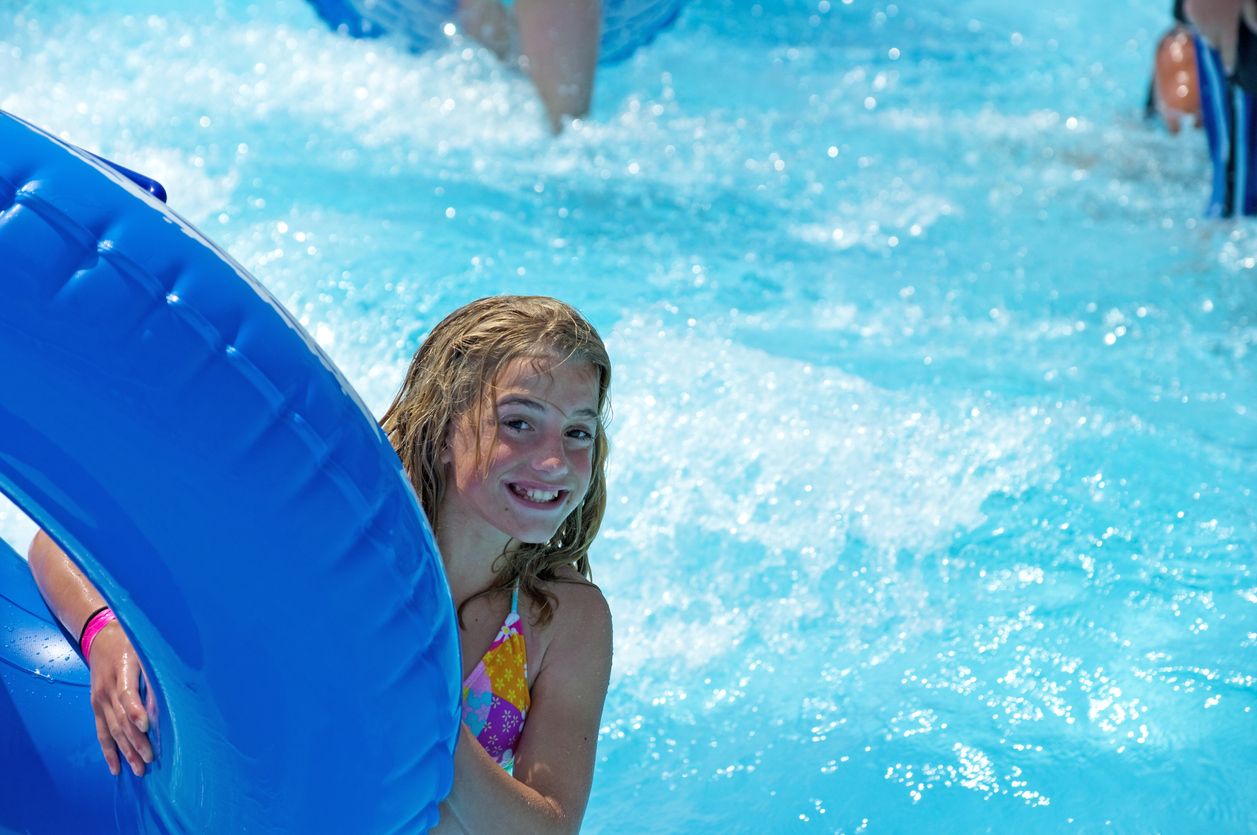 Smiling girl at wave pool in Nashville