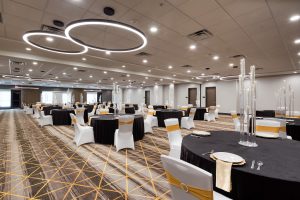 Modern meeting room at Holiday Inn Nashville Airport with conference setup, ideal for meetings and events near BNA